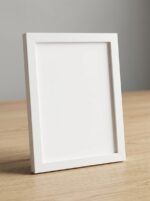 Modern white wooden picture frame with acrylic glass